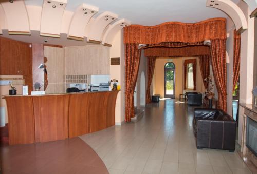 The lobby or reception area at Hotel Fortuna