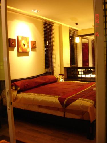 a bedroom with a large bed in a room at room 5 pattaya tower in Pattaya