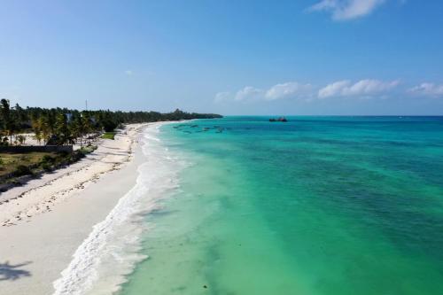 an aerial view of the beach in the ocean at The Sands Beach Resort in Bwejuu