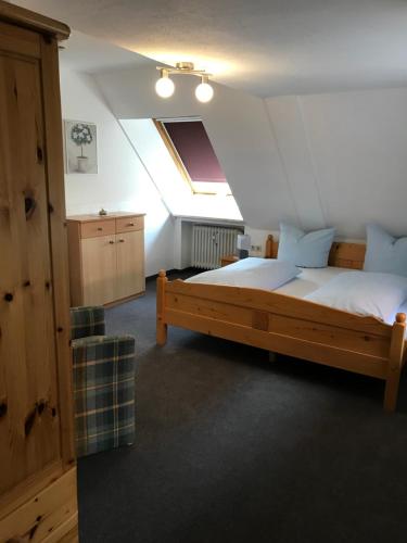 Postel nebo postele na pokoji v ubytování Hotel Guntia Boardinghouse
