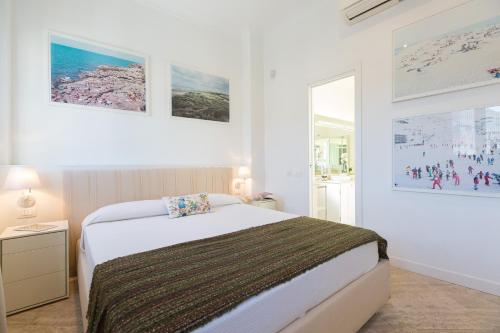A bed or beds in a room at Amazing Penthouse Piazza Venezia