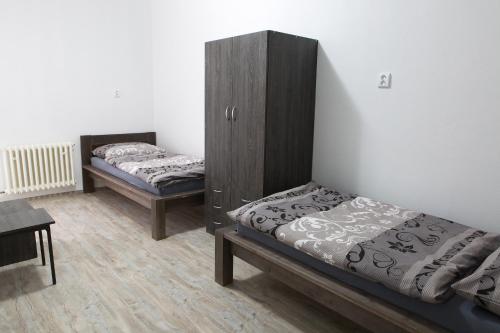 Posteľ alebo postele v izbe v ubytovaní Kopačka