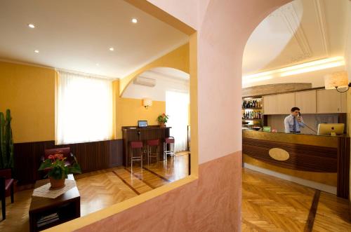 Kuchyň nebo kuchyňský kout v ubytování Hotel Panizza