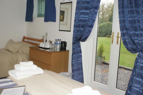 Ένα ή περισσότερα κρεβάτια σε δωμάτιο στο Woodacre B & B