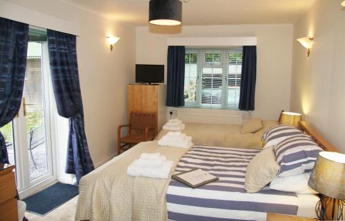 Ένα ή περισσότερα κρεβάτια σε δωμάτιο στο Woodacre B & B