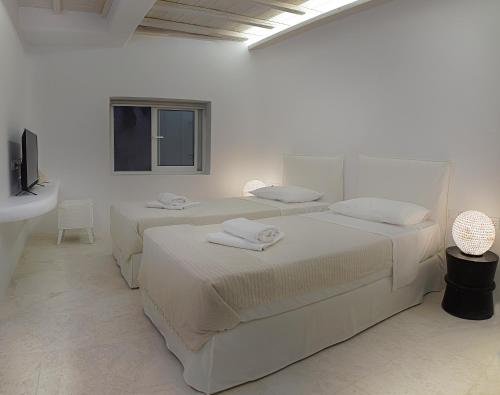 Postel nebo postele na pokoji v ubytování VILLA APOLLO-PRIVATE POOL-AMAZING VIEW