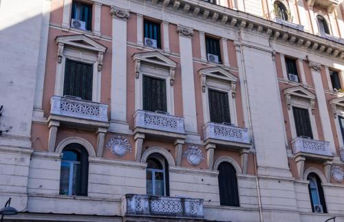 a building with balconies on the side of it at Bellorizzonte in Naples