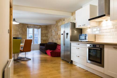 Η κουζίνα ή μικρή κουζίνα στο Wonderful T3 in old town