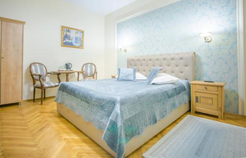 Letto o letti in una camera di Safrano Palace