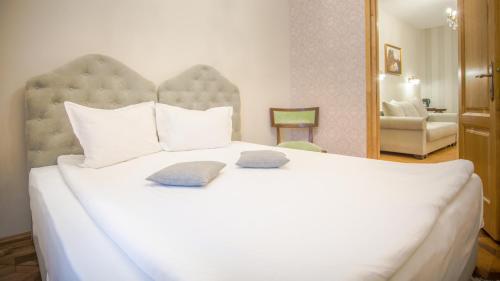 Letto o letti in una camera di Safrano Palace