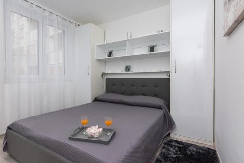 Posteľ alebo postele v izbe v ubytovaní Marea Apartments