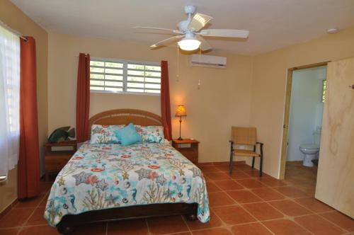 Krevet ili kreveti u jedinici u okviru objekta Isla Hermosa Guesthouse