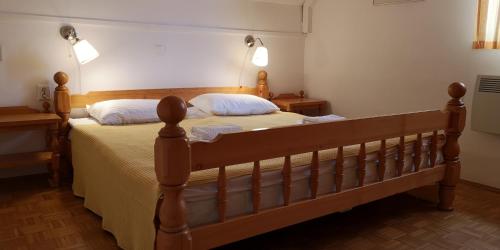 Postel nebo postele na pokoji v ubytování Apartma Marija Hiška 79
