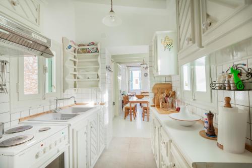 Kuchyň nebo kuchyňský kout v ubytování Casa Rinio