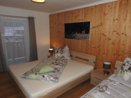 Ferienhaus Weixelbraunにあるベッド