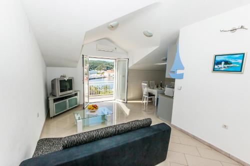 Kuchyň nebo kuchyňský kout v ubytování Apartments Sumartin