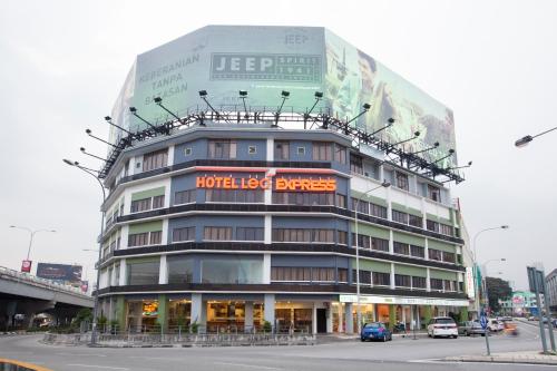 a building with a sign on the top of it at LEO Express Hotel in Kuala Lumpur