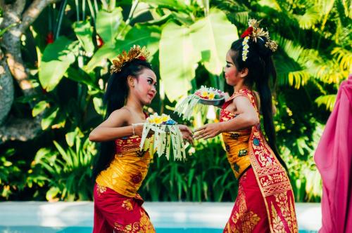two girls are standing next to each other at Chandra Bali Villas in Seminyak
