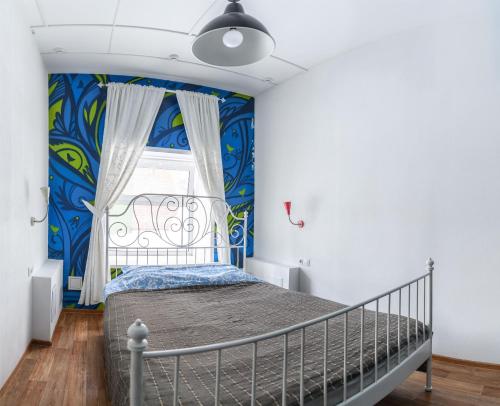 Säng eller sängar i ett rum på FunKey Hostel