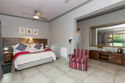 Voodi või voodid majutusasutuse Sunrock Guesthouse toas