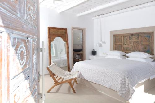 Säng eller sängar i ett rum på V&V Guest House - Luxury Suites