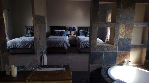 Кровать или кровати в номере House Haven Guesthouse