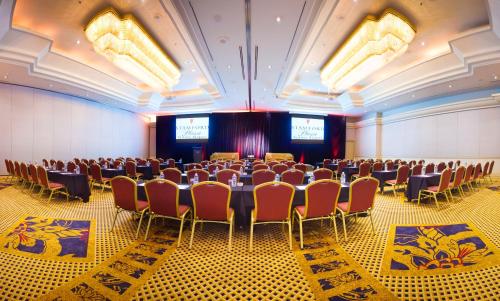 a conference room with a table and chairs in it at Stamford Plaza Sydney Airport Hotel & Conference Centre in Sydney