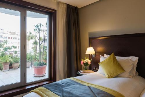 Katil atau katil-katil dalam bilik di Le Diwan Hotel Rabat - MGallery Collection