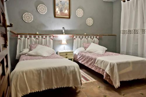 Ένα ή περισσότερα κρεβάτια σε δωμάτιο στο LA POSADA