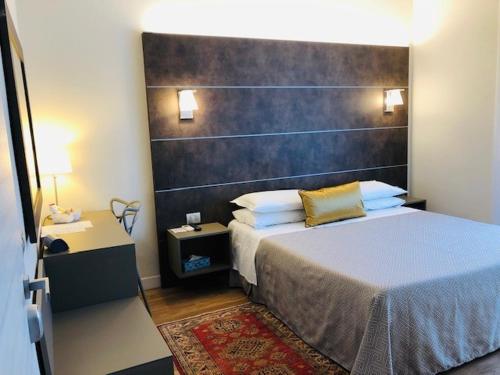 Postel nebo postele na pokoji v ubytování Hotel La Nuova Rotaia