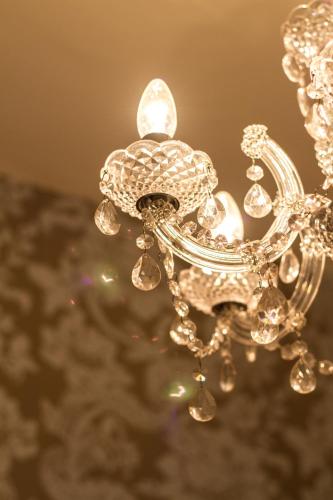a close up of a silver chandelier at Fair Oak House Exeter Airport in Exeter