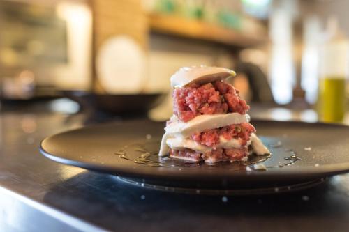 a piece of dessert on a plate on a table at Wine Resort Conti di San Bonifacio in Montemassi