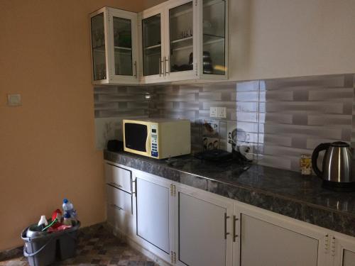 Η κουζίνα ή μικρή κουζίνα στο Santosa Villa