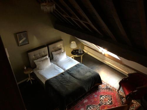 เตียงในห้องที่ Boutique Hotel Grote Gracht