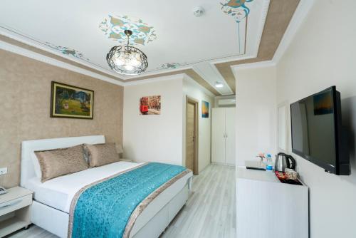 Μια τηλεόραση ή/και κέντρο ψυχαγωγίας στο ATAM HOTEL