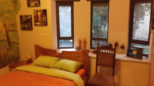 Postel nebo postele na pokoji v ubytování Art Apartments