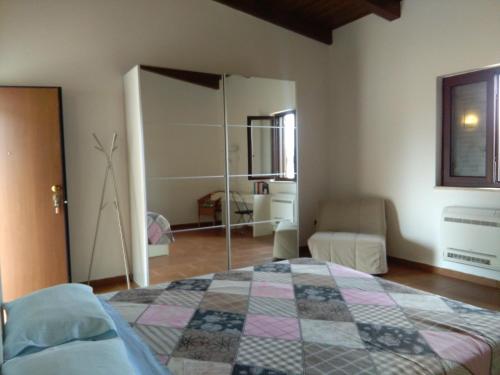 Łóżko lub łóżka w pokoju w obiekcie Palazzo Piccolo
