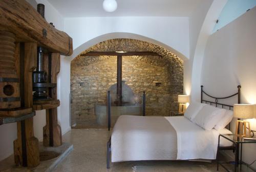 Postel nebo postele na pokoji v ubytování Santo Mercurio Country House