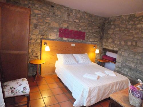 Cama o camas de una habitación en Mas Colom
