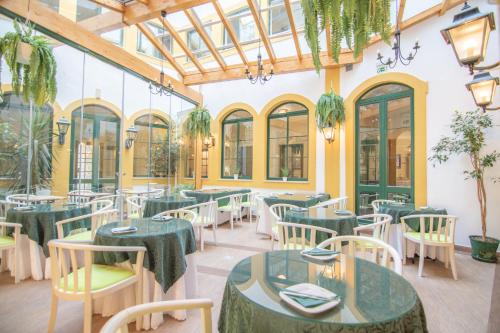 Restaurace v ubytování Loule Jardim Hotel