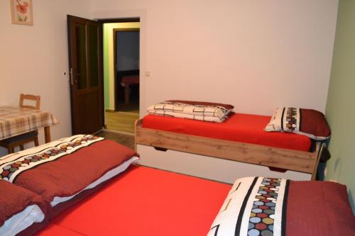 a room with two bunk beds and a hallway at Apartment Holiday Lungötz in Annaberg im Lammertal