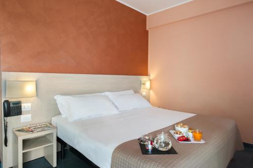 Postel nebo postele na pokoji v ubytování Hotel Testani Colleferro
