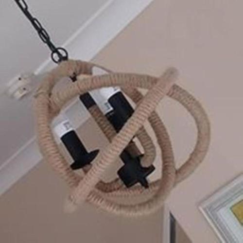 a hanging basket hanging from a ceiling at Invergarry Room Only Guest House For Adults in Windermere