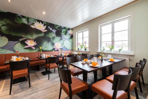 En restaurang eller annat matställe på Hotel Seerose Lindau Bodensee