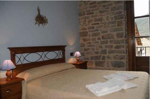 Ένα ή περισσότερα κρεβάτια σε δωμάτιο στο Casa Felices