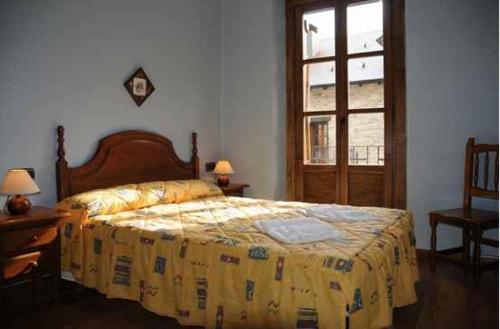 Ένα ή περισσότερα κρεβάτια σε δωμάτιο στο Casa Felices