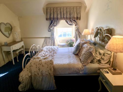 Llit o llits en una habitació de The Suites At Ty Anne