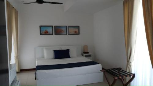 Katil atau katil-katil dalam bilik di 123 Ocean Front Condo