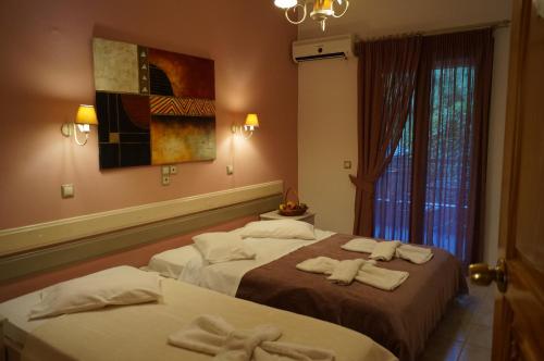 A bed or beds in a room at Nontas Home