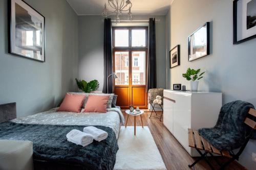 En eller flere senge i et værelse på Spanko w Krakowie